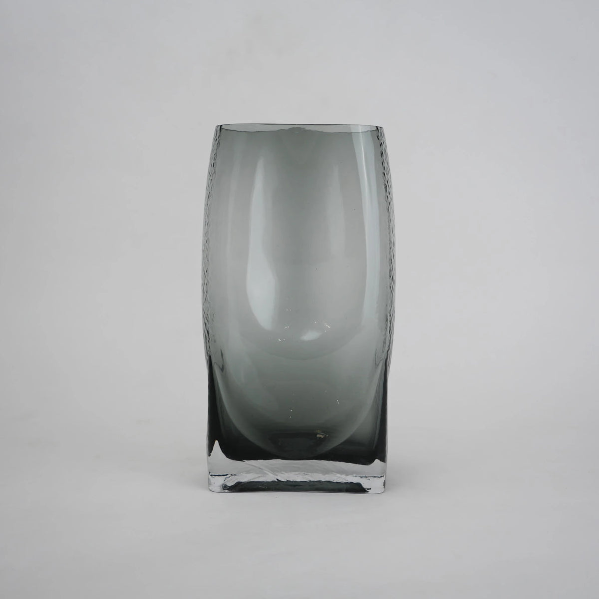 grey modern glass vase with curved interior design
