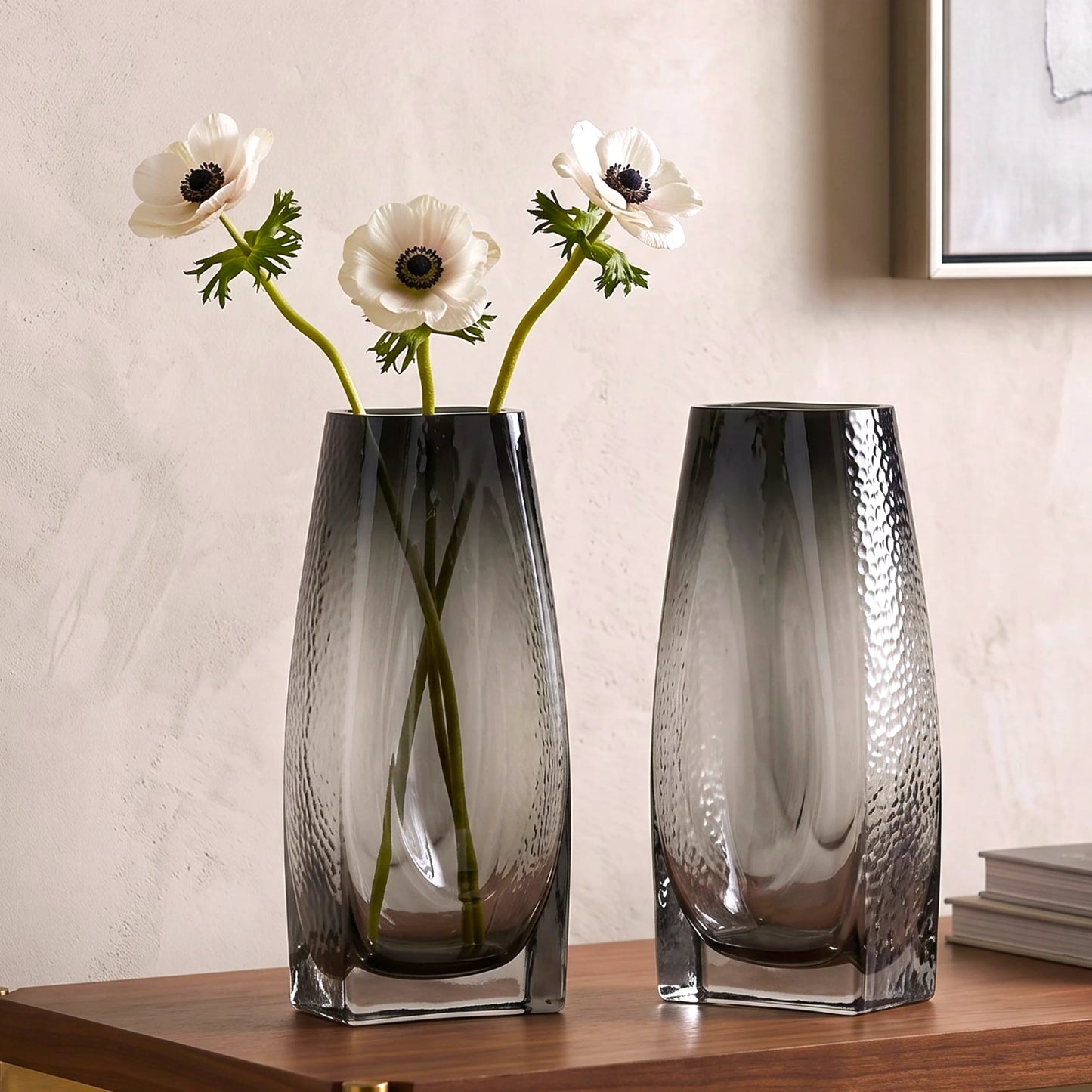 Curved grey vase pair w/ rose, travertine