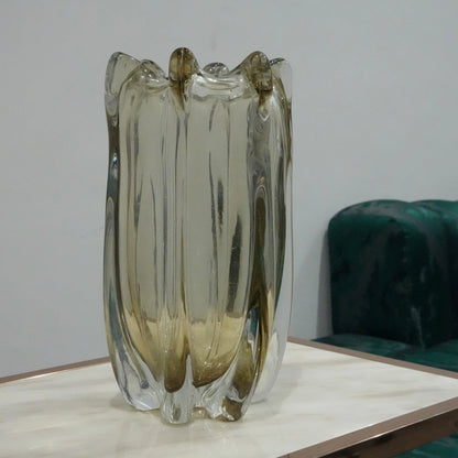 Artistic handblown glass vase with modern fluid silhouette and elegant smoky tone for luxury tabletop and console decor