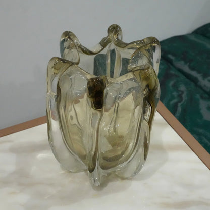 Artisan blown glass vase with soft smoke tint and flowing contemporary silhouette for upscale interior decoration