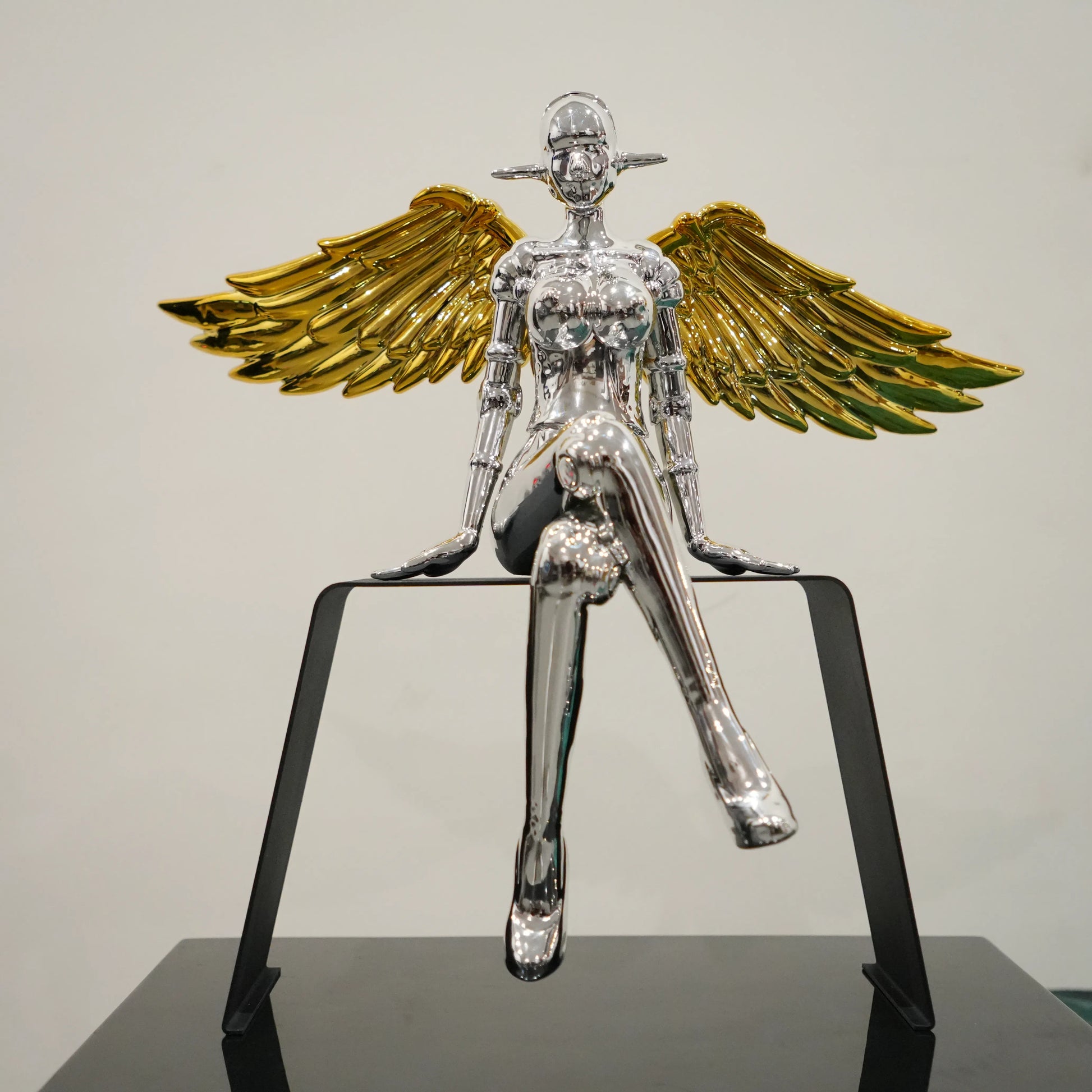 Silver angel lady decor with antique gold wings and black metal frame accent