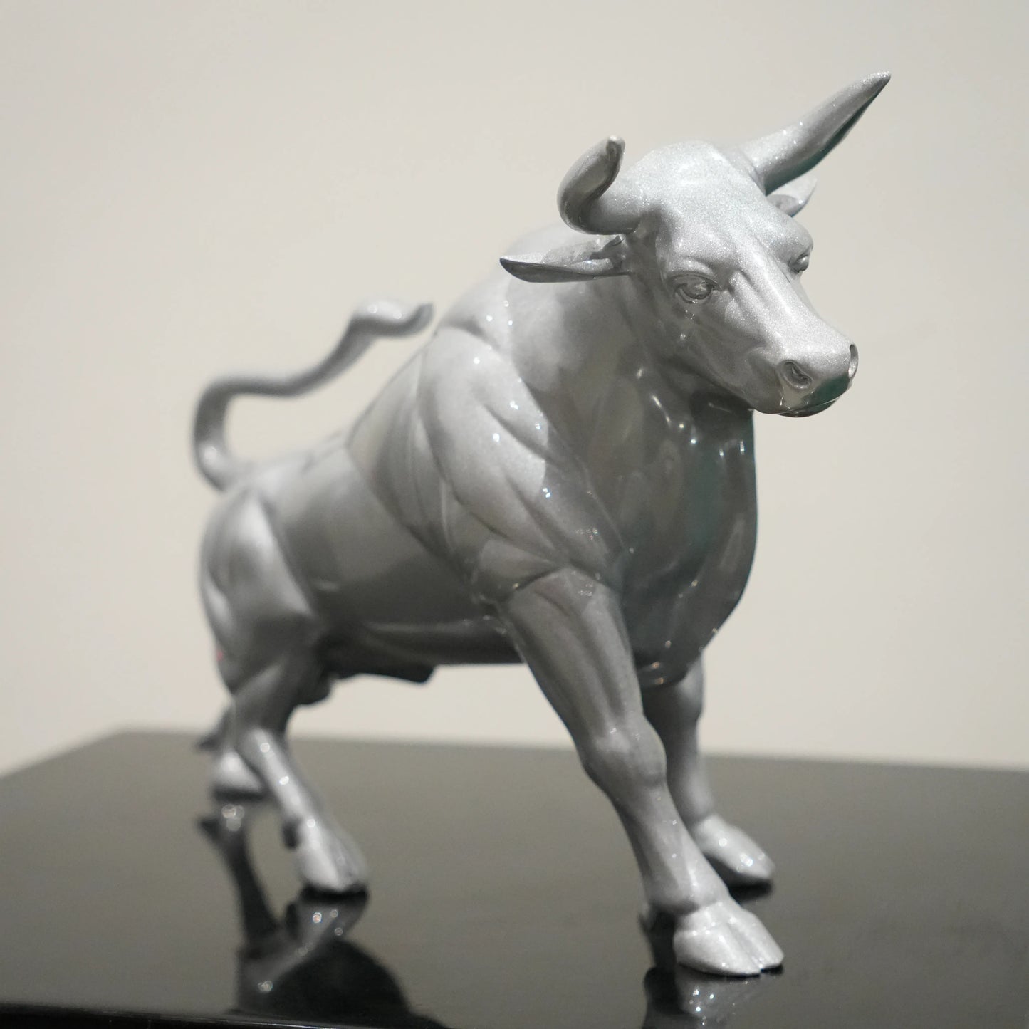 Sterling silver bull decor accent with geometric contours for modern home and office interiors