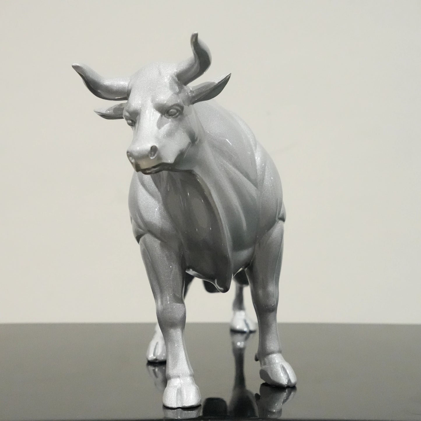 Sterling silver bull decor accent with geometric contours for modern home and office interiors