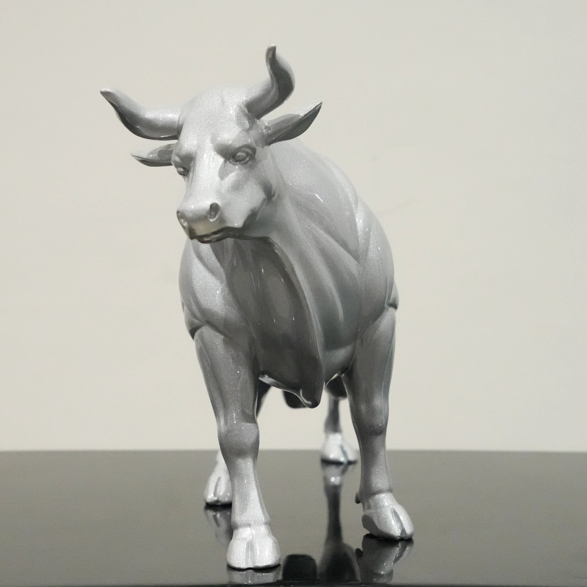 Sterling silver bull decor accent with geometric contours for modern home and office interiors