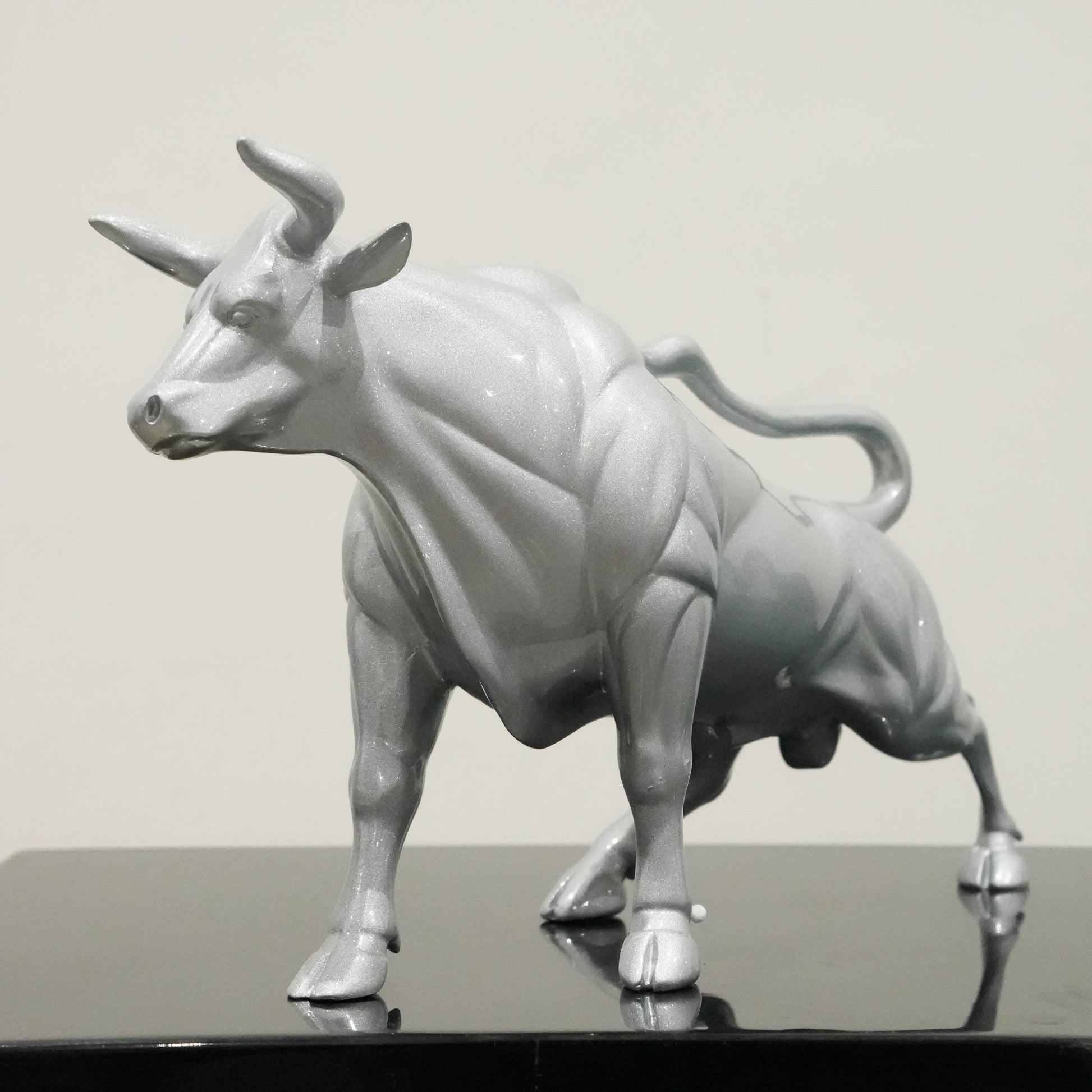 Sterling silver bull decor accent with geometric contours for modern home and office interiors