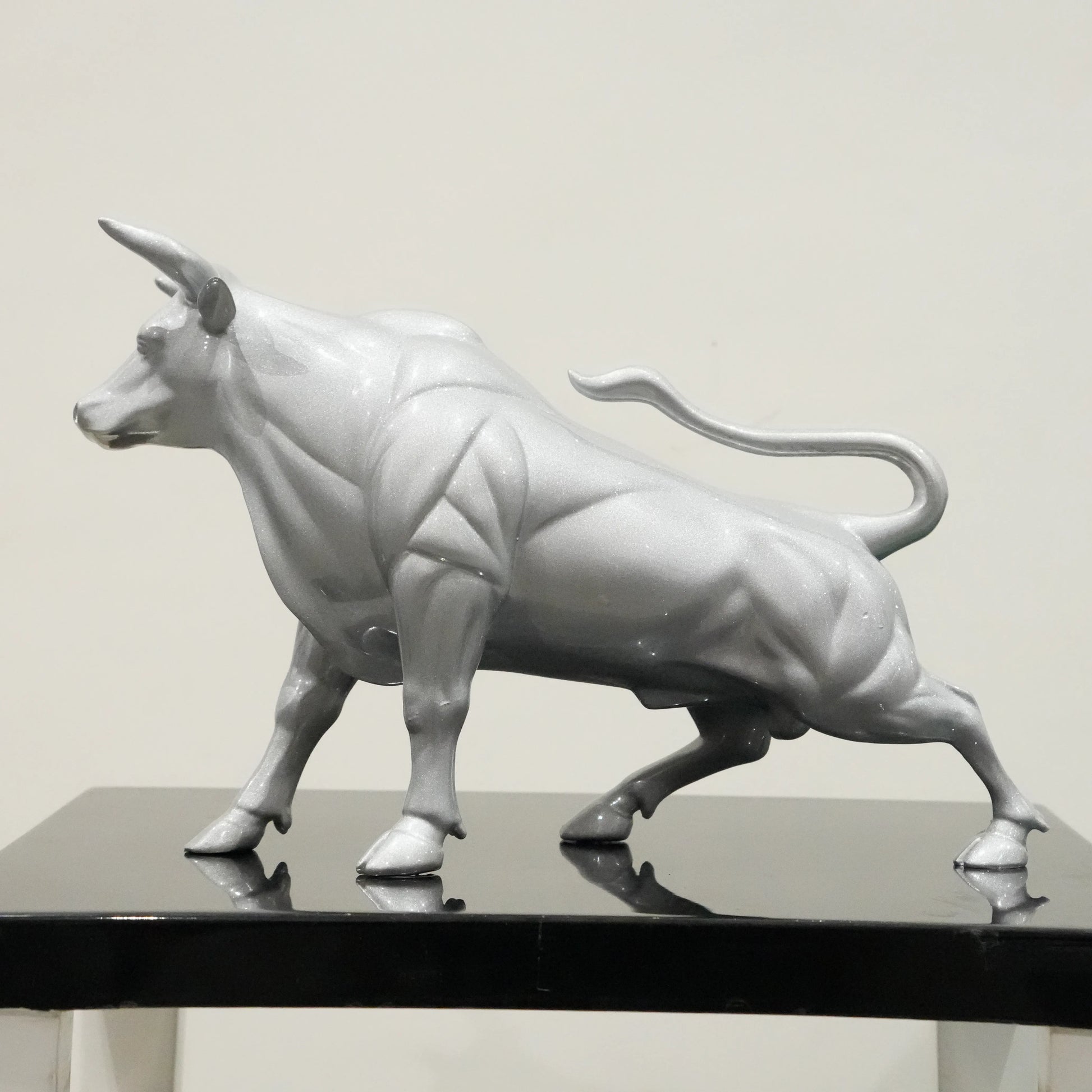 Sterling silver bull decor accent with geometric contours for modern home and office interiors