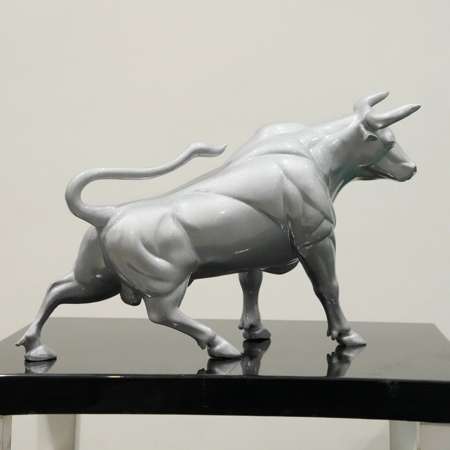 Sterling silver bull decor accent with geometric contours for modern home and office interiors