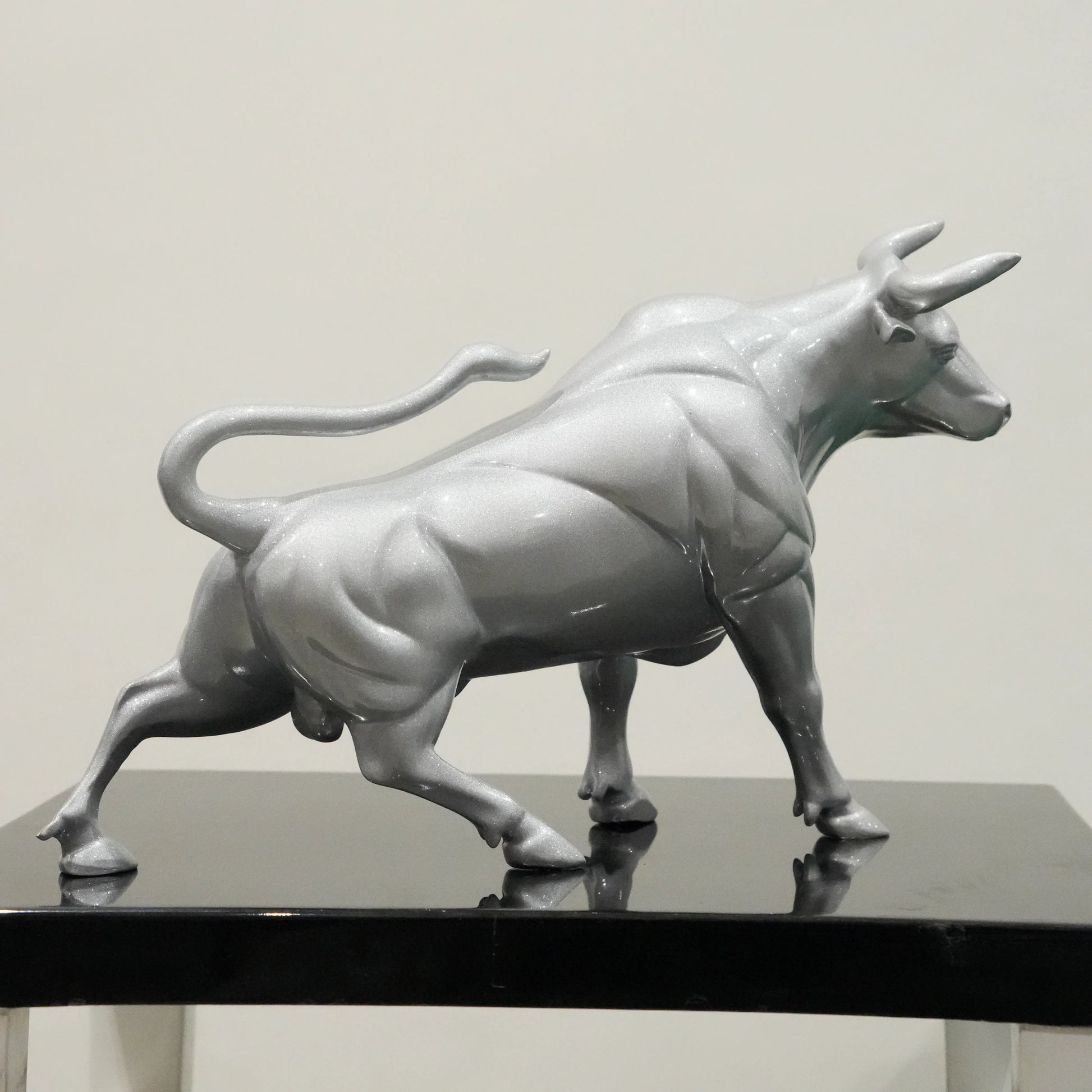 Sterling silver bull decor accent with geometric contours for modern home and office interiors