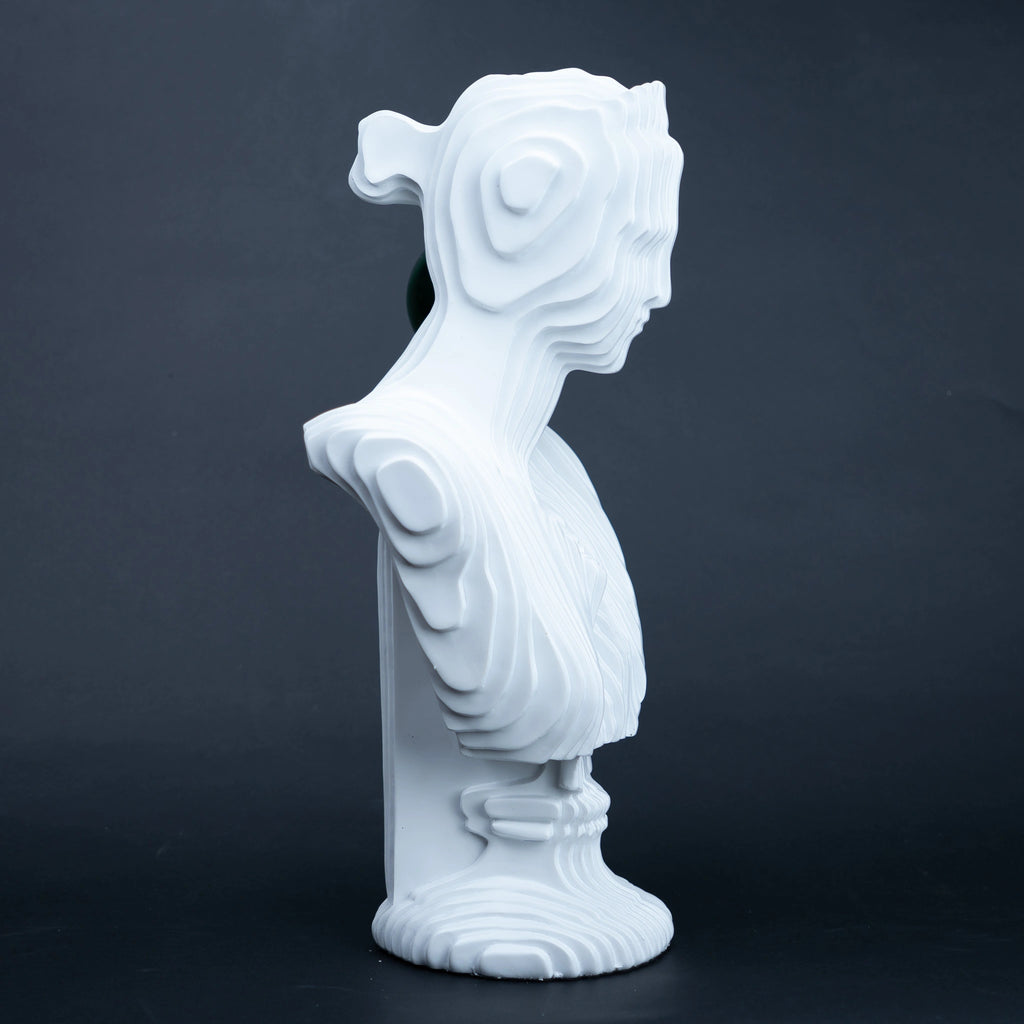 White abstract ribbed bust sculpture with green accent sphere, modern console decor piece for living room styling, minimal interior aesthetic