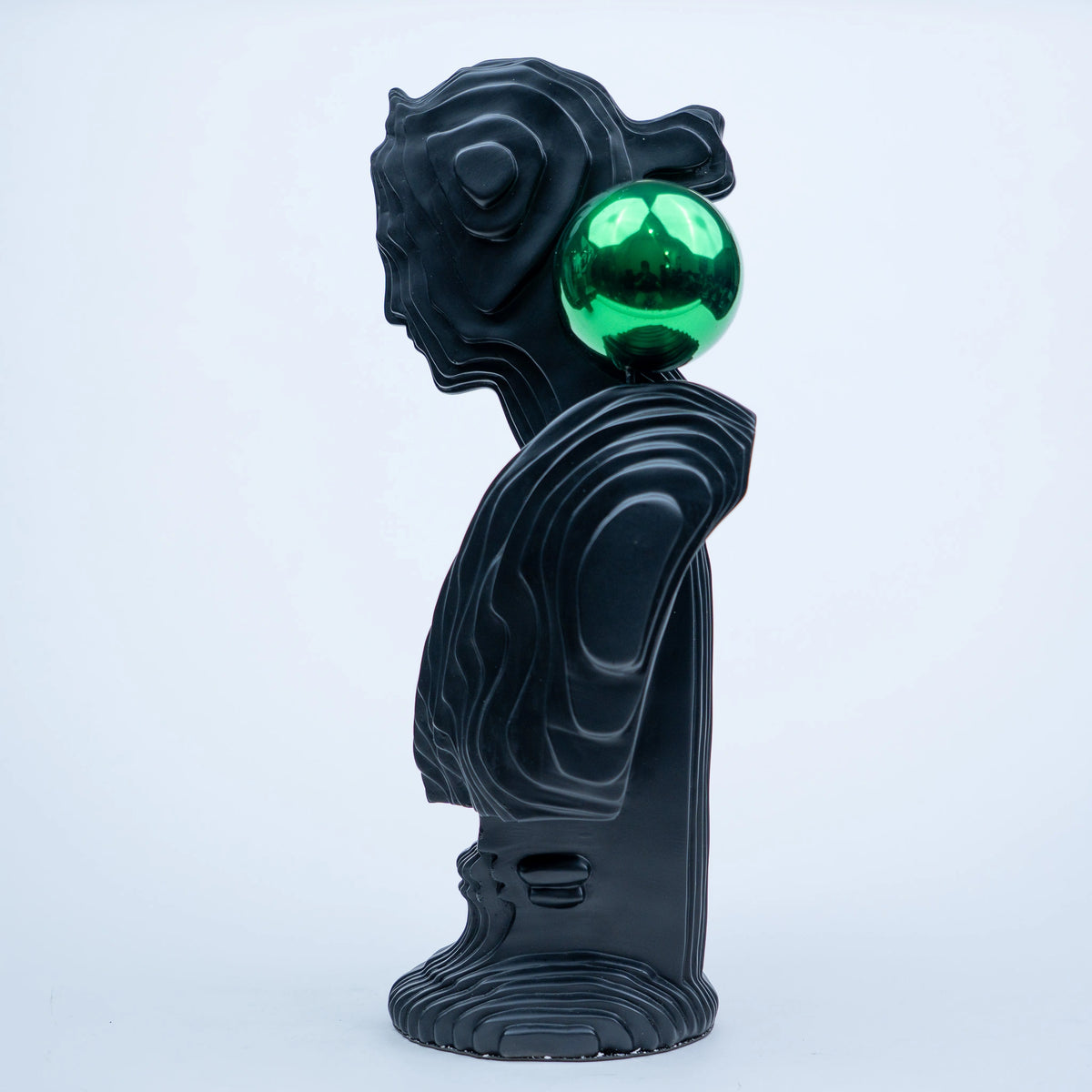 Matte black modern bust sculpture featuring an abstract human face design for luxury contemporary home décor