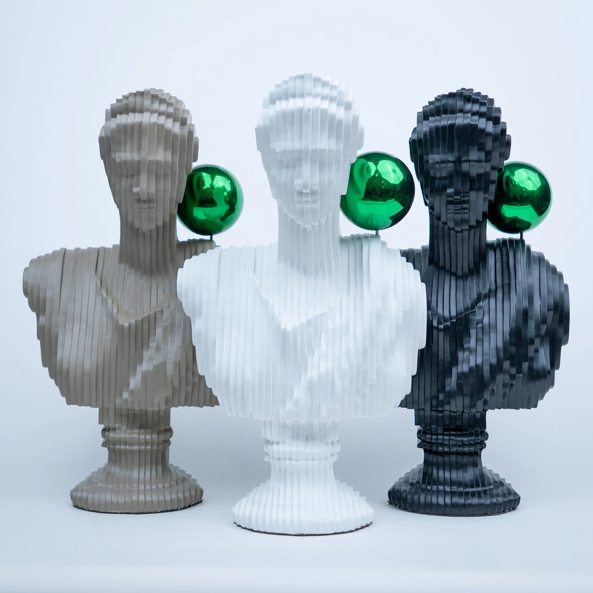 White abstract ribbed bust sculpture with green accent sphere, modern console decor piece for living room styling, minimal interior aesthetic