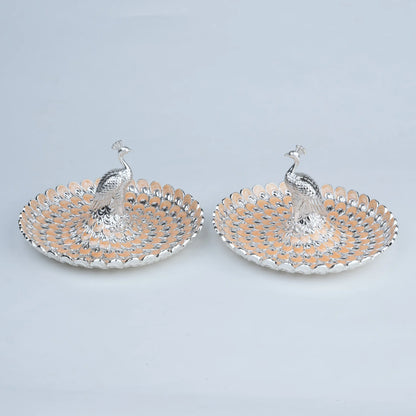 Royal peacock serving platter set with intricate feather detailing for festive table decor