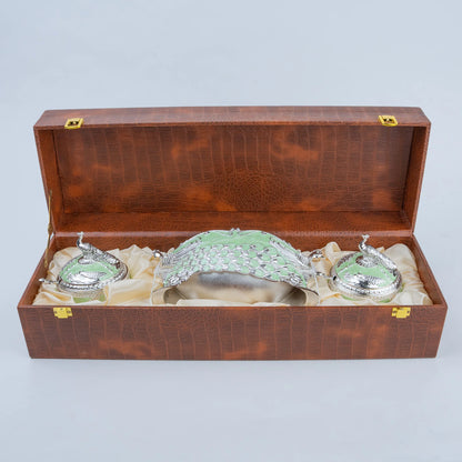 Royal peacock dry fruit set with decorative silver peacock detailing and premium brown storage case