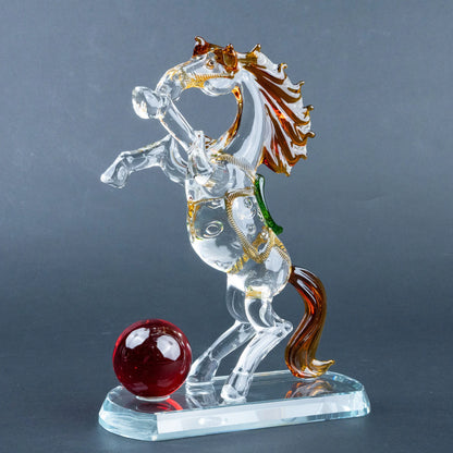 Decorative crystal horse sculpture with amber mane and transparent base