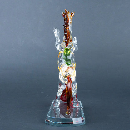 Decorative crystal horse sculpture with amber mane and transparent base