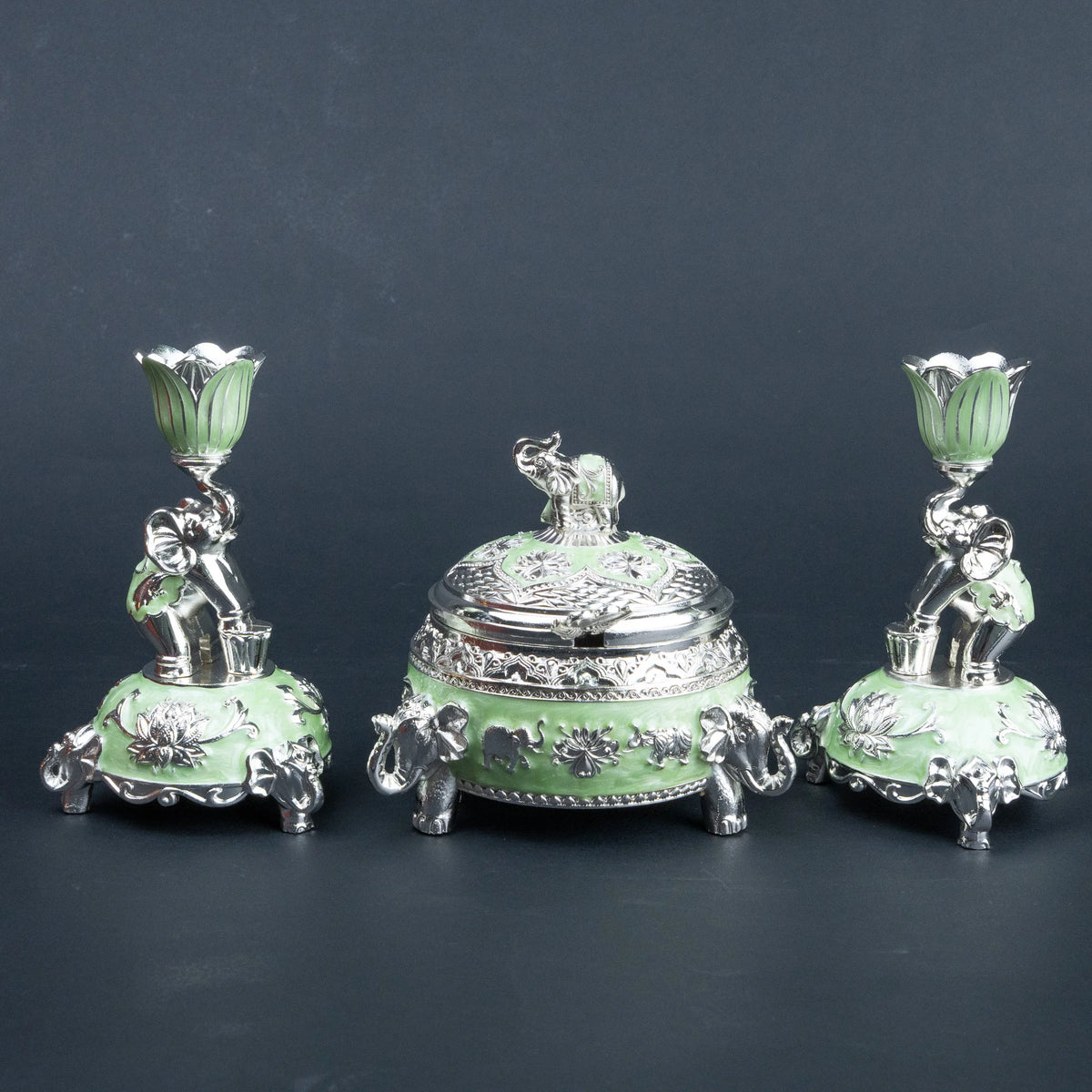 Mint green and silver elephant decorative set styled as a festive tabletop centrepiece