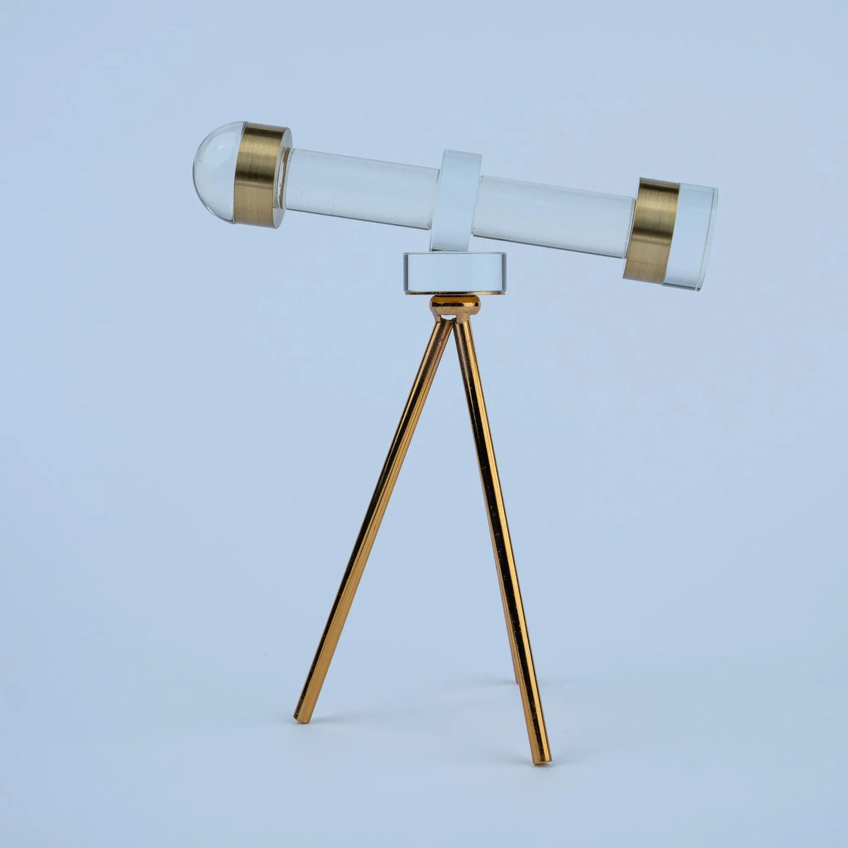 Celestial Scope table décor with transparent barrel and gold-toned accents