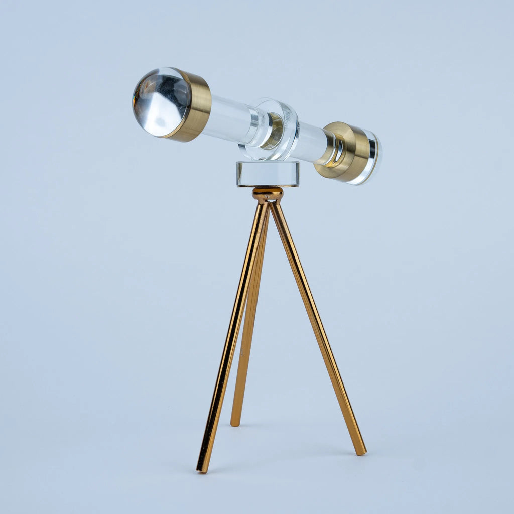 Telescope-style tabletop accent with gold details and a slender tripod