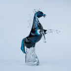 Blue crystal horse figurine with sapphire-blue accents and transparent detailing