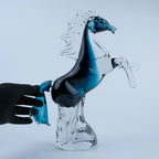 Blue crystal horse figurine with sapphire-blue accents and transparent detailing