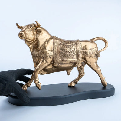 Golden Bull Figurine, Gold Finish Decorative Bull Statue with Ornate Engraved Details and Black Base for Living Room, Office, Console Table and Home Décor