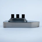 Smoky grey glass ship decor with stepped deck and black details