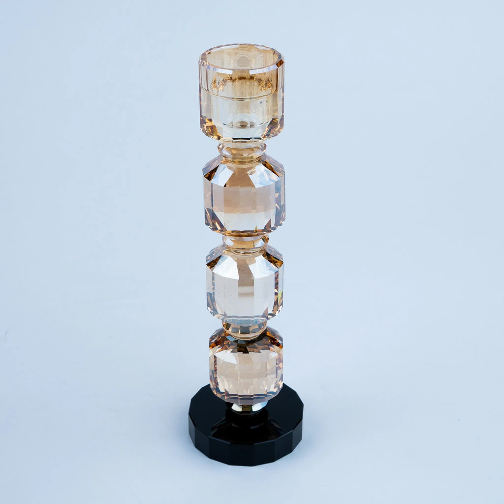 Modern decorative candle holder with stacked geometric forms and black bases