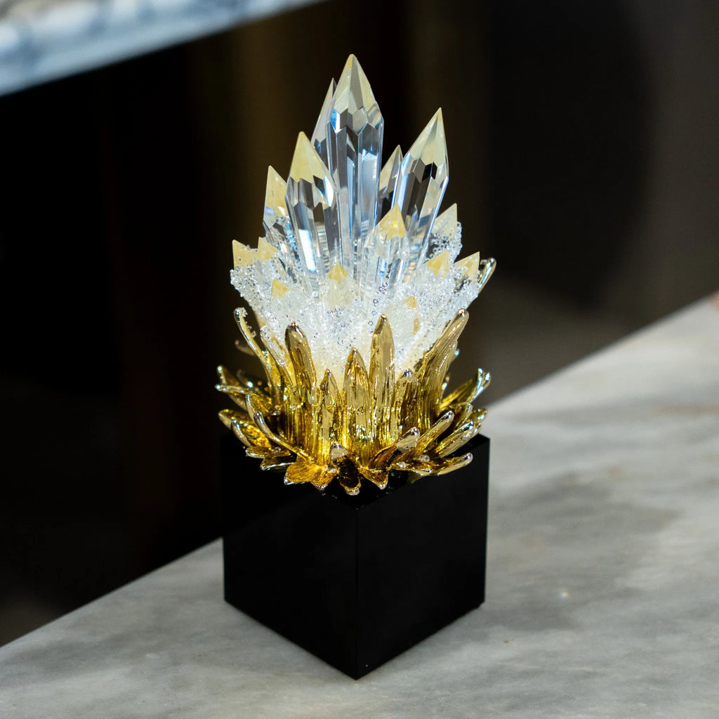 Crystal-like decorative peaks with gold-tone detailing in a coordinated home decor set