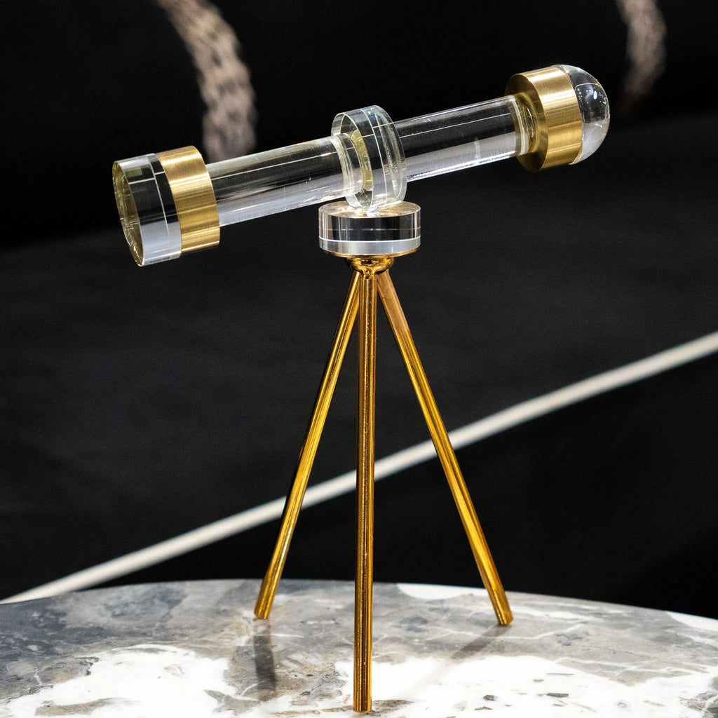 Decorative telescope table accent with transparent barrel and gold-toned ends