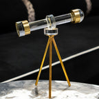 Decorative telescope table accent with transparent barrel and gold-toned ends