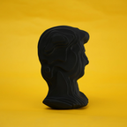 Black ripple bust profile on gold paper
