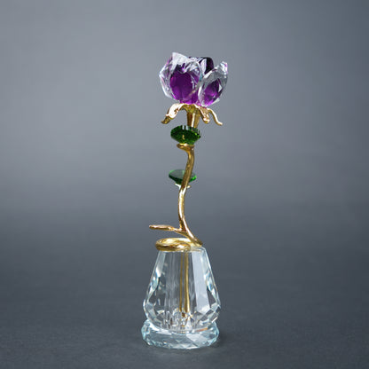 Crystal rose with purple gem on a gray background