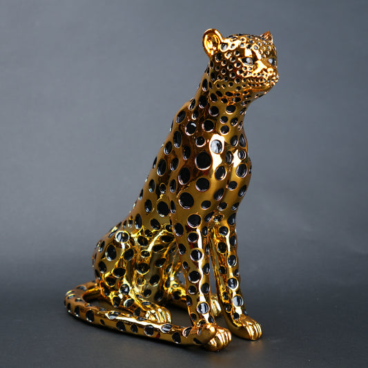 luxury leopard figurine in gold with black detailing modern decor