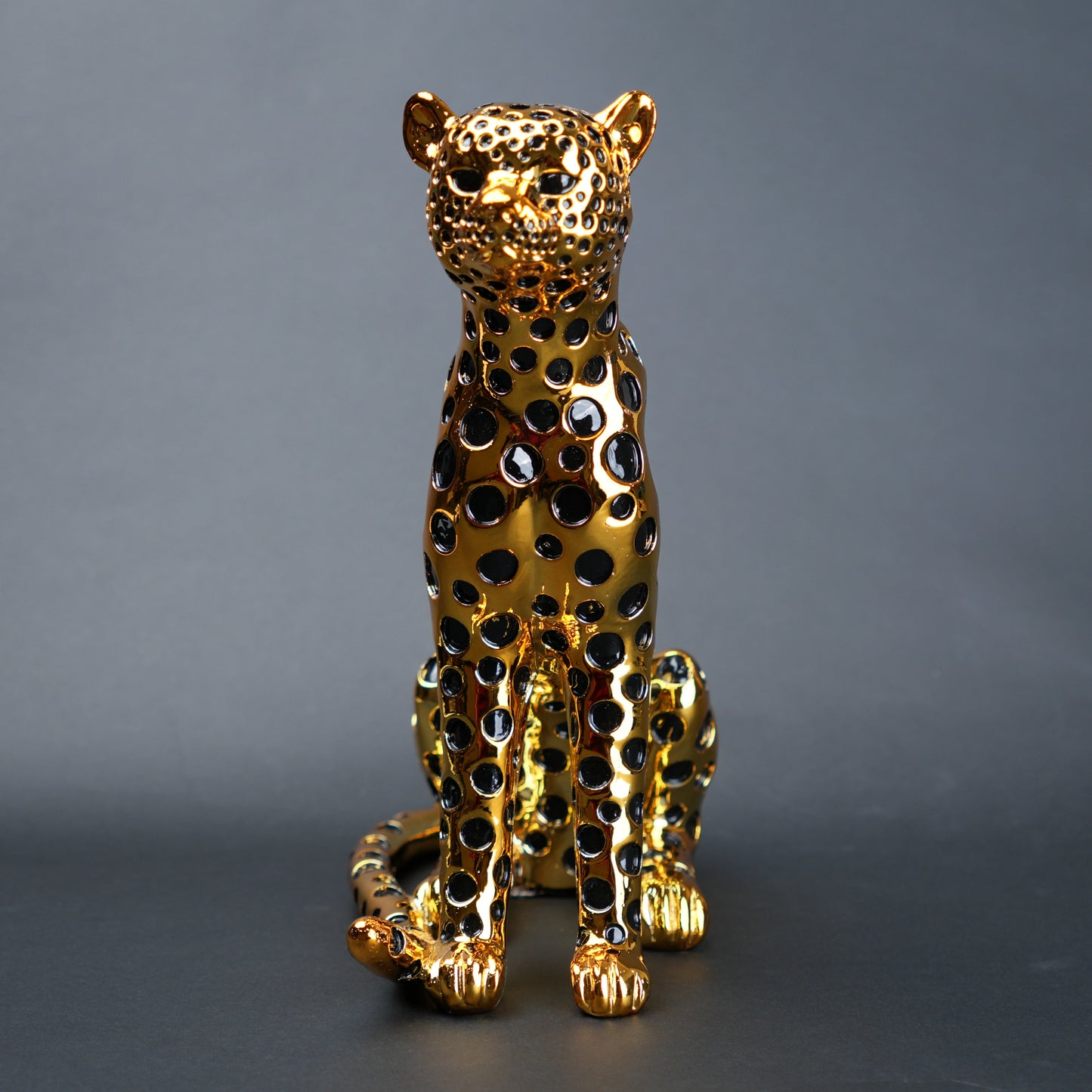 luxury leopard figurine in gold with black detailing modern decor
