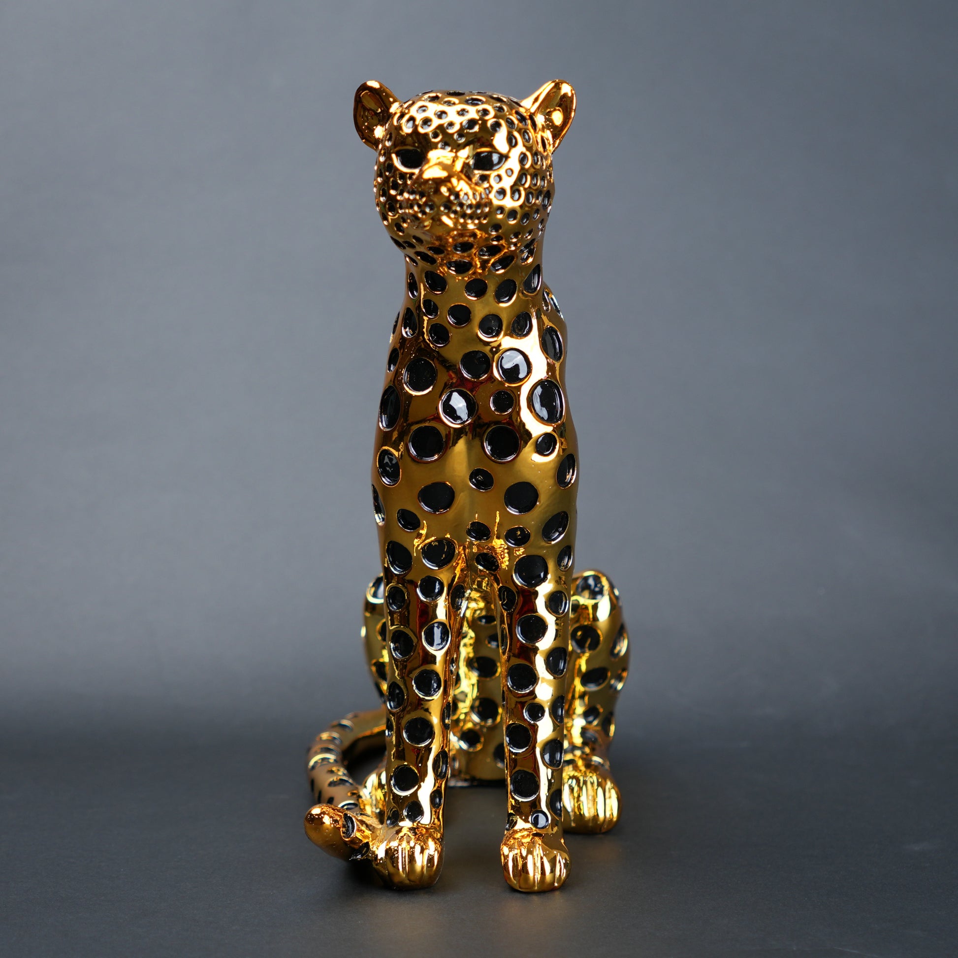 luxury leopard figurine in gold with black detailing modern decor