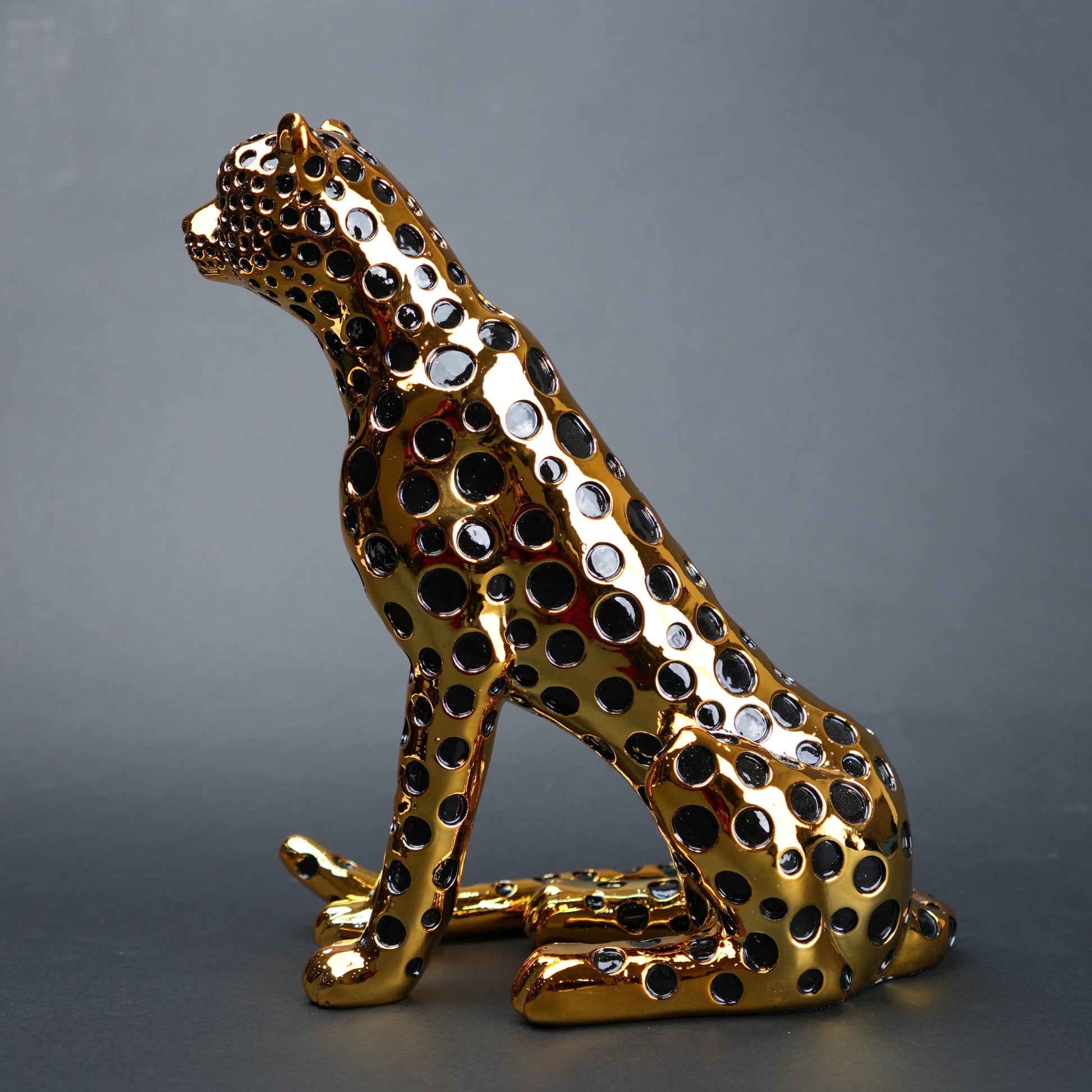 luxury leopard figurine in gold with black detailing modern decor