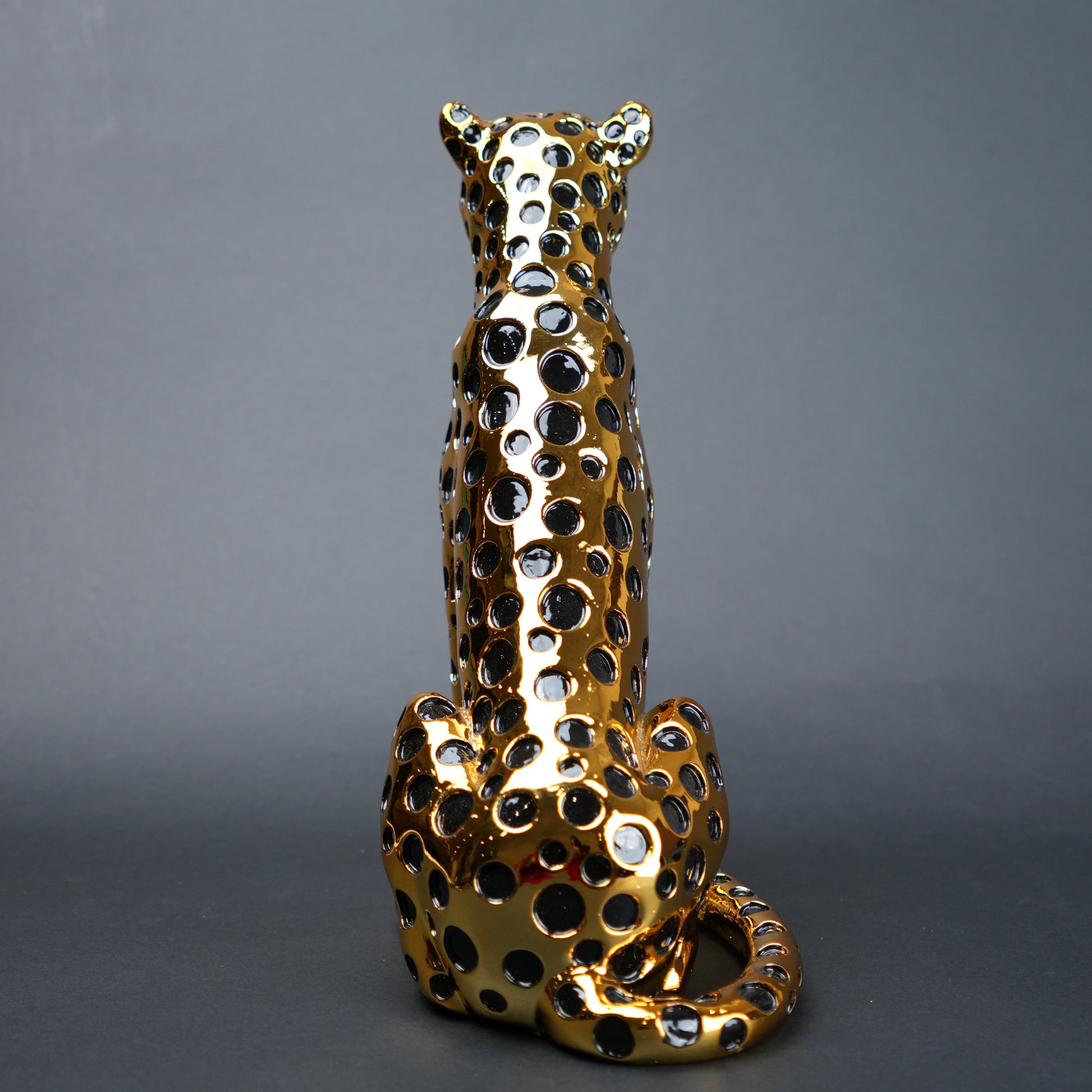 luxury leopard figurine in gold with black detailing modern decor