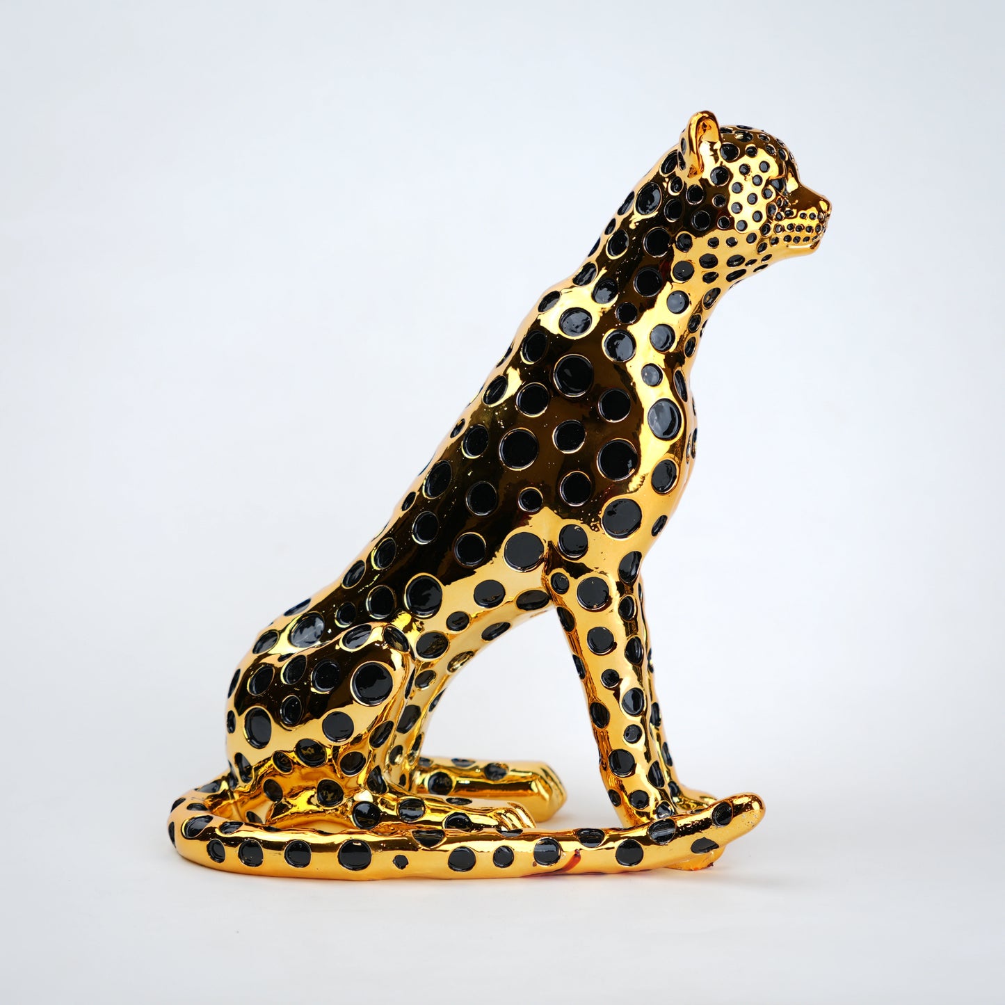 luxury leopard figurine in gold with black detailing modern decor