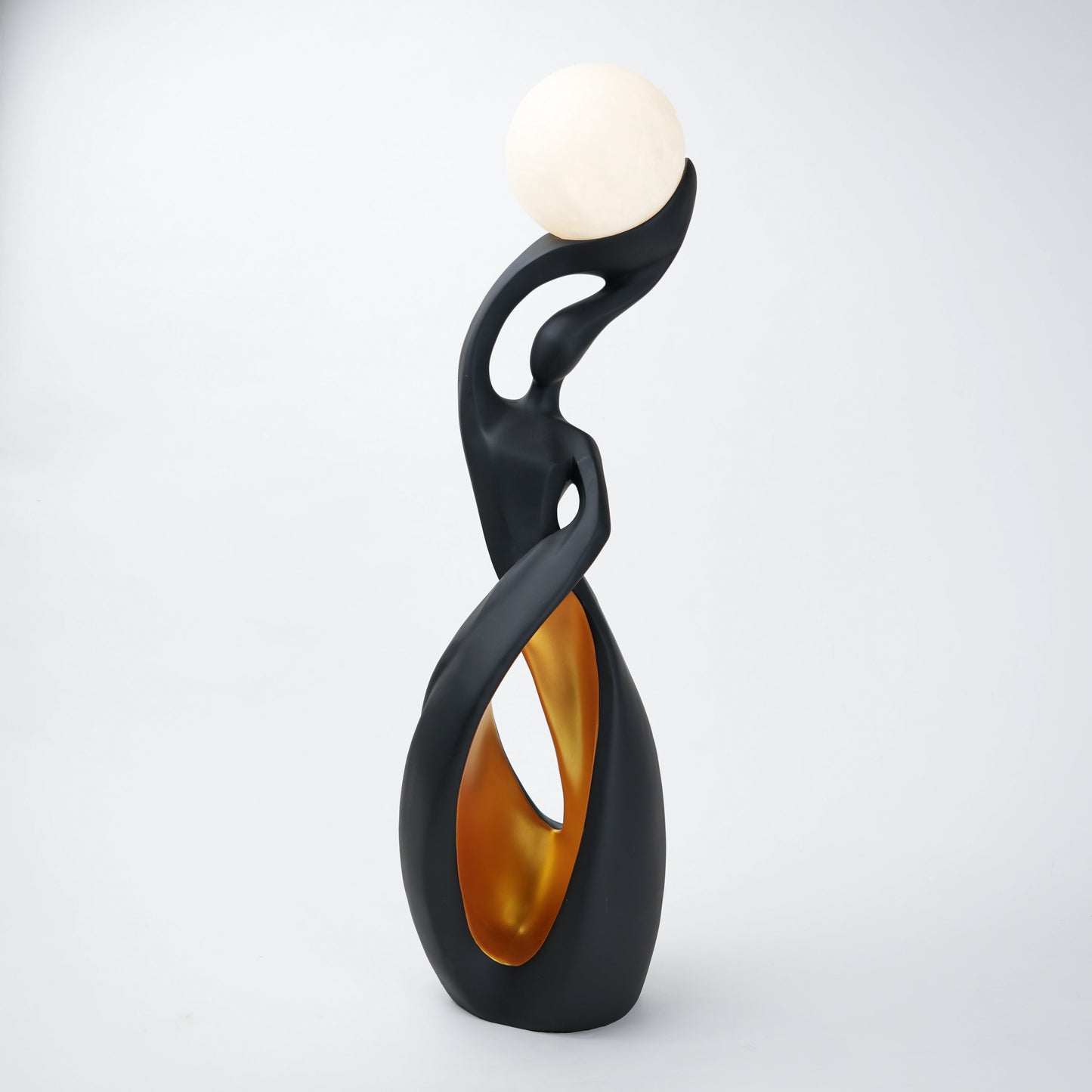 modern sculptural table lamp with glowing orb ambient lighting