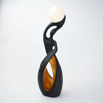 modern sculptural table lamp with glowing orb ambient lighting