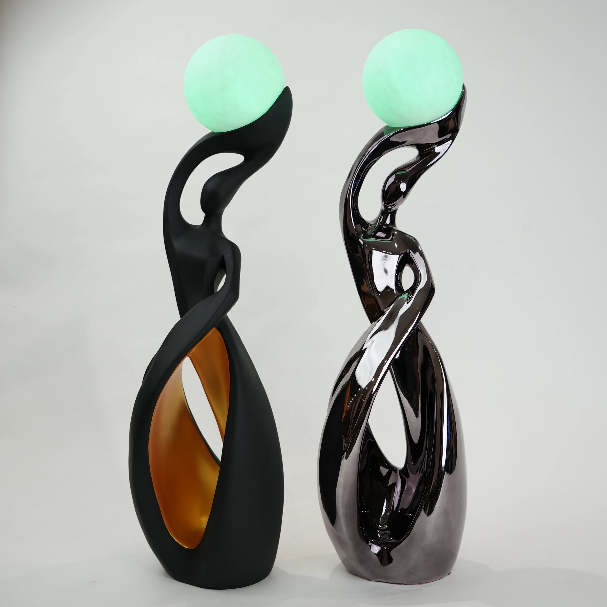 modern sculptural table lamp with glowing orb ambient lighting