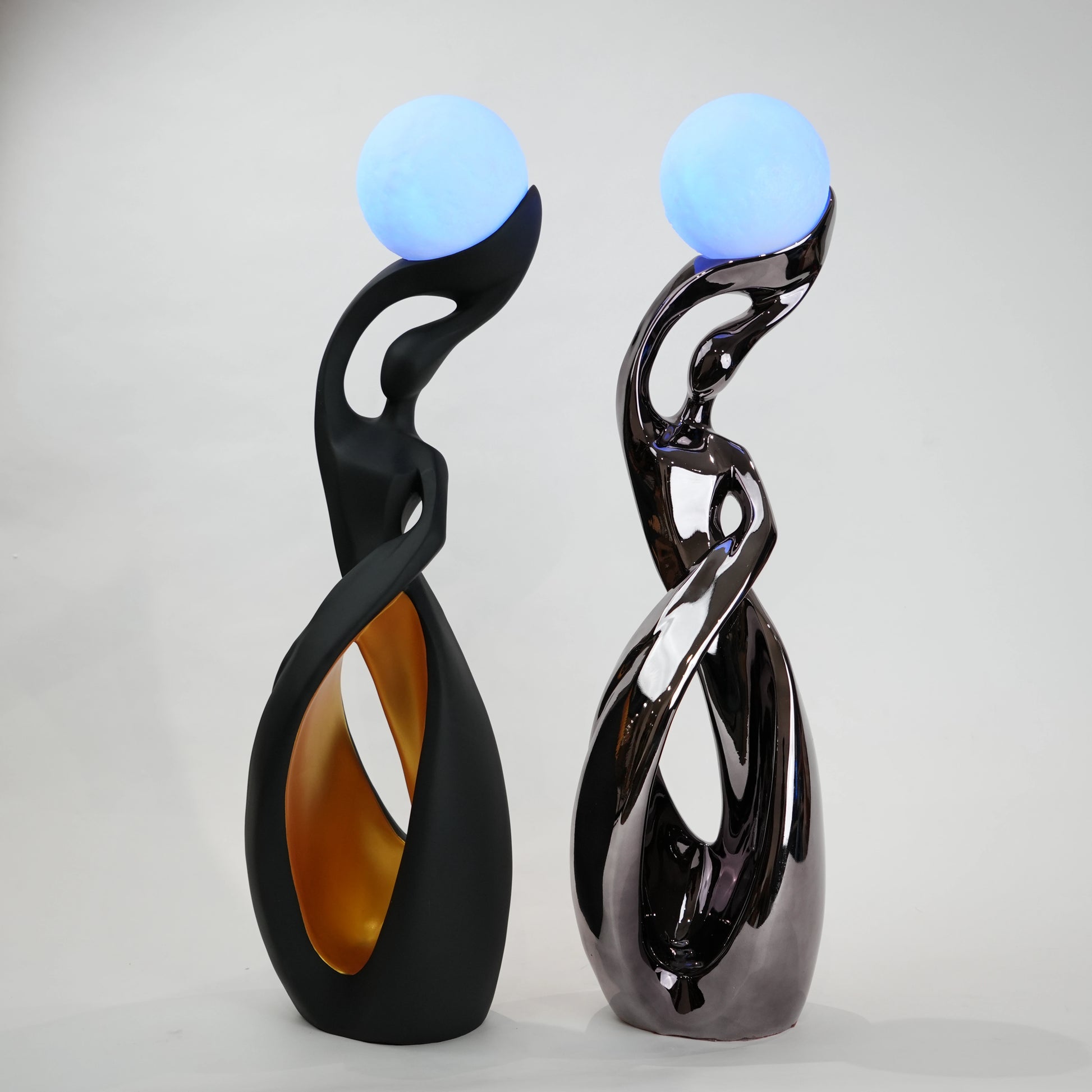 modern sculptural table lamp with glowing orb ambient lighting