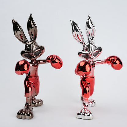 Resin bunny boxer figurine with chrome black finish and scarlet red gloves and shorts