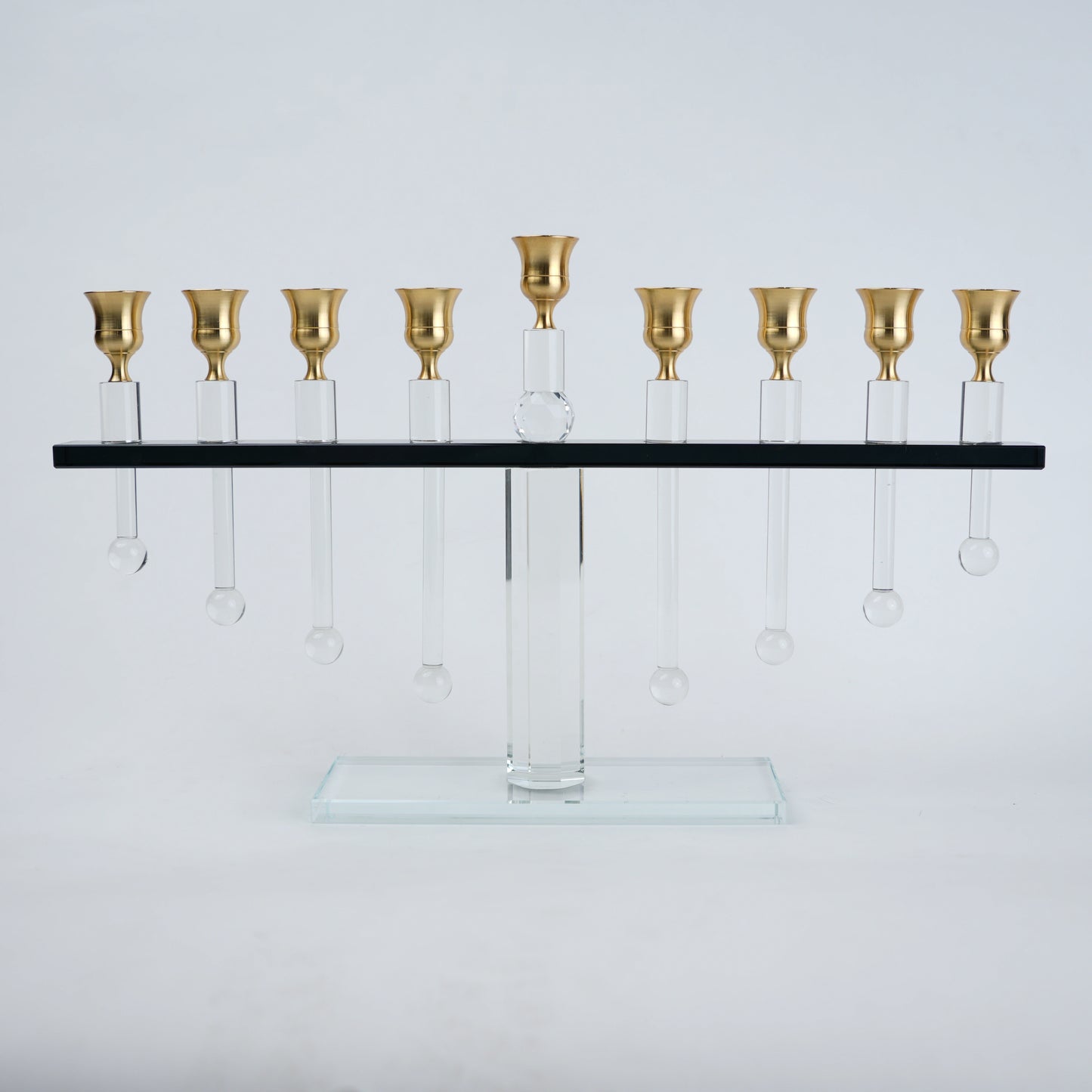 linear crystal candle holder with gold cups and transparent base for modern table decor