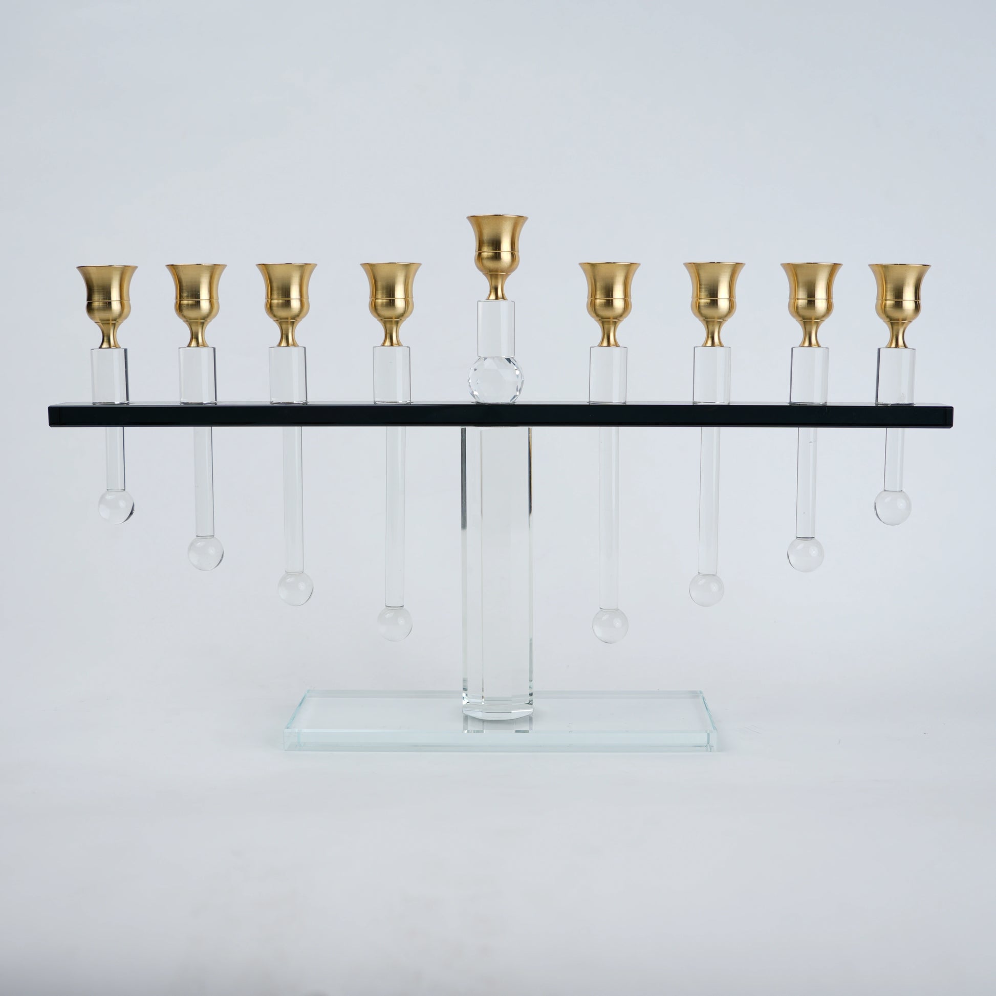 linear crystal candle holder with gold cups and transparent base for modern table decor
