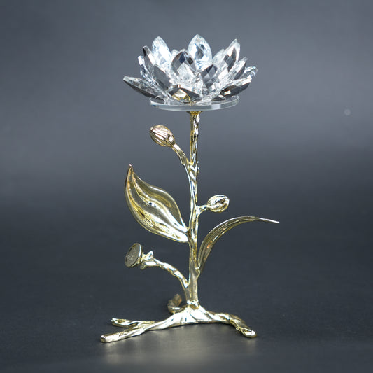 Decorative crystal flower with gold base on a dark background