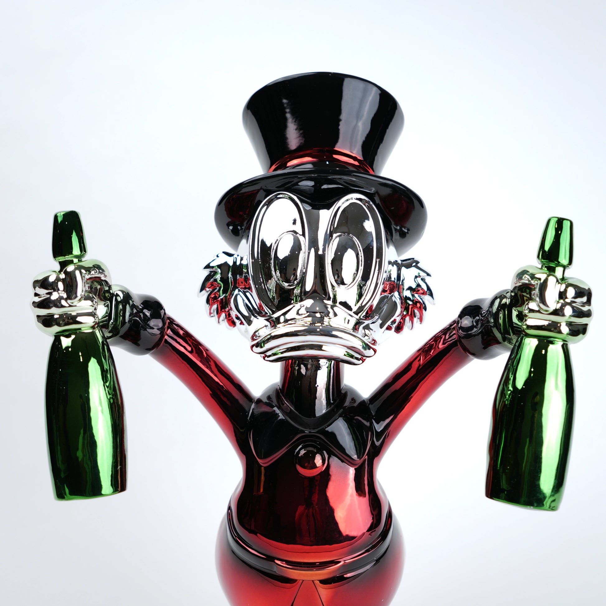 red duck figurine holding green bottle chrome finish luxury cartoon decor accent