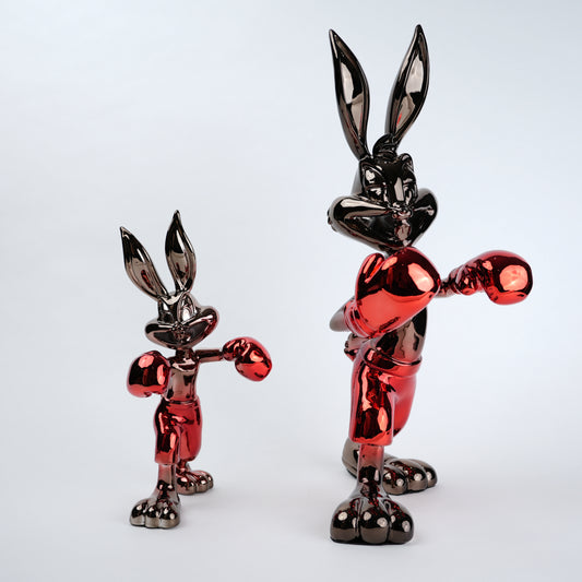 Resin bunny boxer figurine with chrome silver finish and crimson red gloves and shorts