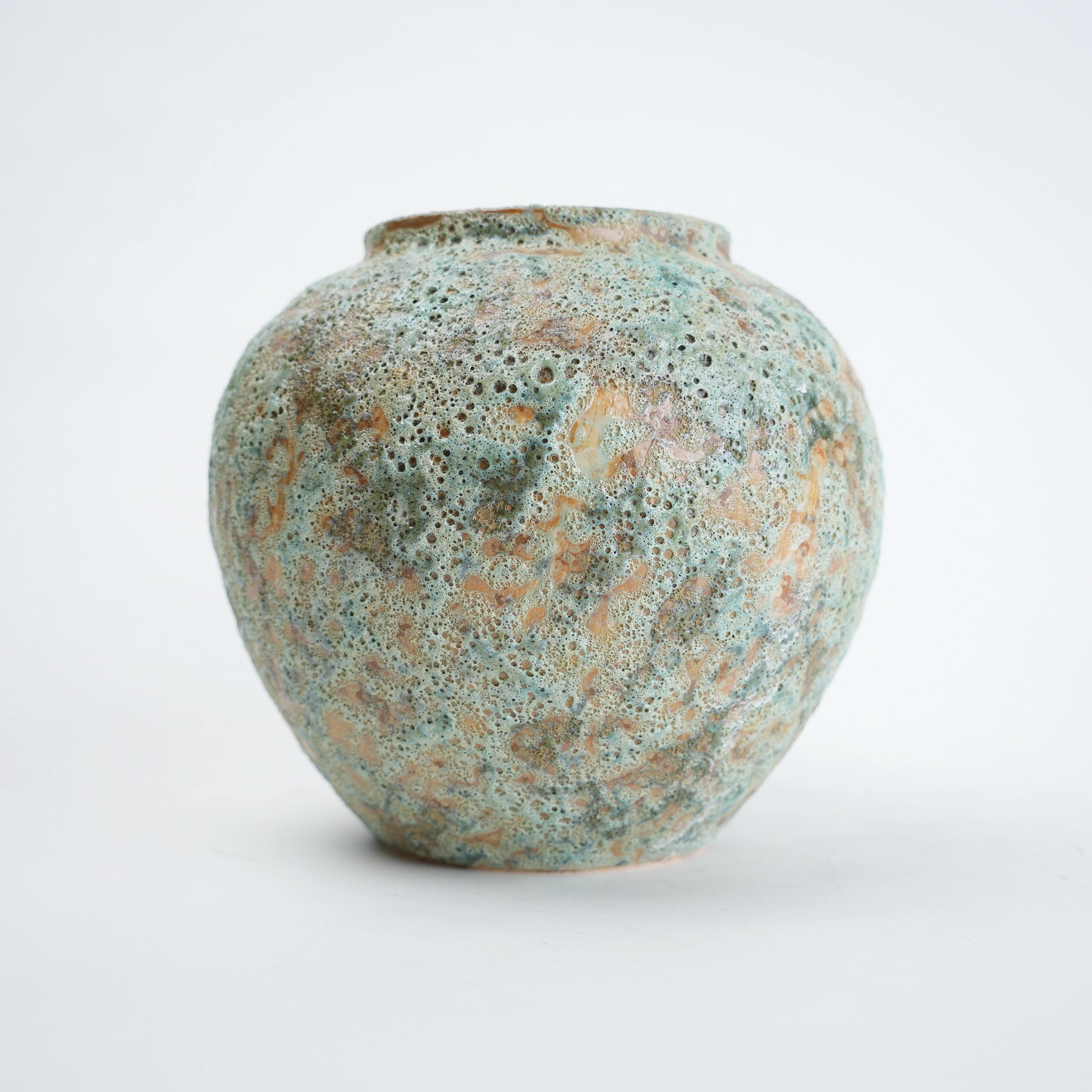 Speckled aqua vase, lava-textured front