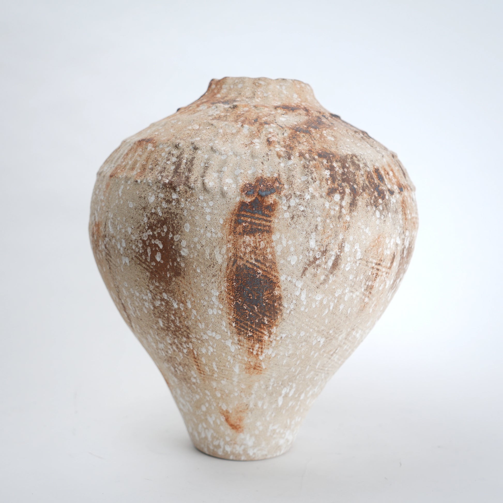 Rust patina ceramic vase with textured earthy finish available in small and large sizes for home decor